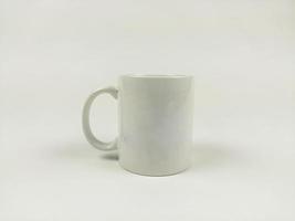 mock up mug. Template of a white mug on the white background photo