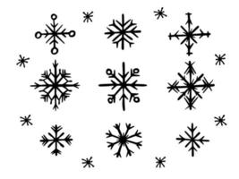 colección de copos de nieve de navidad de garabatos en blanco y negro. conjunto simple dibujado a mano de elementos de diseño vector