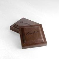 3D rendering dark chocolate bar closeup on white marble background photo