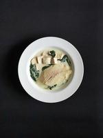 Singapore Fish Soup in White Plate photo