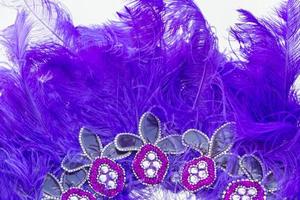 Embroidered helmet with stones and feathers for carnival photo