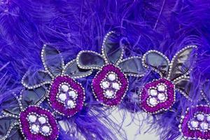 Embroidered helmet with stones and feathers for carnival photo