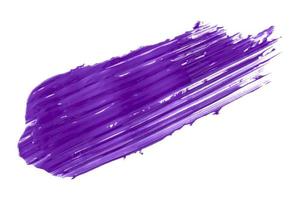 Glossy purple brush isolated on white background. photo