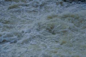 Stormy waves, water close up, storm, dark water. photo