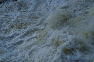 Stormy waves, water close up, storm, dark water. photo