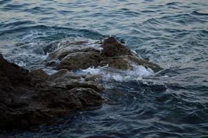 Croatia beach, rocks at the beach, sea water, waves photo