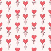 A pattern of candy hearts on a stick. Candy heart pattern. Pattern for Valentine's Day. vector