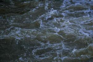 Stormy waves, water close up, storm, dark water. photo