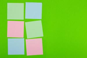 Colorful documents with copy space on a colored background. View from above. For notes and ideas. photo