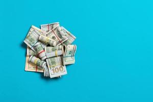 US Dollar bills bundles stack. one hundred dollar bills with stack of money in the middle. Top view of business concept on background with copy space photo