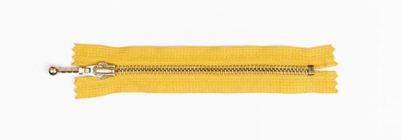 yellow zipper isolated on white. top view photo