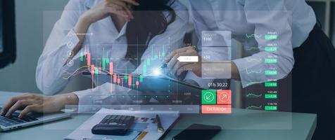 planning analyze indicator and strategy buy and sell, Stock market, Business growth, progress or success concept. Businessman or trader is pointing a growing virtual hologram stock, invest in trading photo