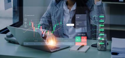 planning analyze indicator and strategy buy and sell, Stock market, Business growth, progress or success concept. Businessman or trader is pointing a growing virtual hologram stock, invest in trading photo