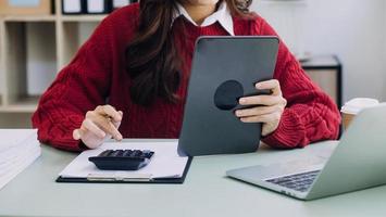 Business team present. Photo professional investor working new startup project. Finance meeting.Digital tablet laptop computer smart phone using, keyboard docking screen foreground,filter