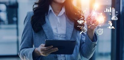 woman Hand holding virtual Global Internet connection metaverse. Business global internet connection application technology and digital marketing, Financial and banking, Digital link tech, big data. photo