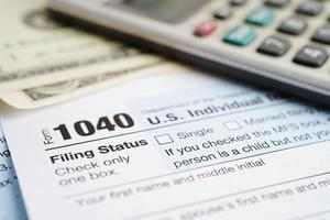 Tax form 1040 U.S. Individual Income Tax Return, business finance concept. photo