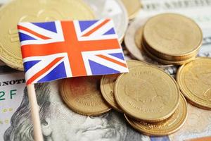 Stack of coins money with United kingdom flag, finance banking concept photo