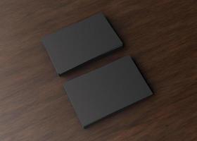 Blank black business cards on dark wooden table. Mockup for branding identity. Two stacks, to show both sides of card. Template for graphic designers. Free space, copy space. 3D rendering. photo