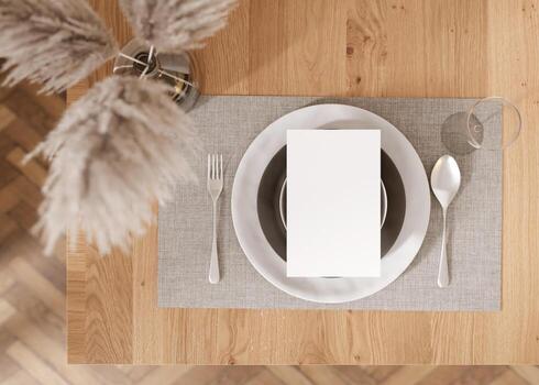 White vertical flyer mock up with home accessories and plates on the table. Paper sheet, blank template for your design. Top view, close-up. Brochure, menu card, invitation presentation. 3D rendering. photo