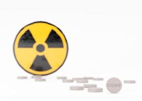Anti-Radiation Pills, Iodine tablets, tablets for radiation protection. Potassium iodine tablet protecting against the dangers of accidental exposure to radioactivity. Nuclear threats. 3d rendering. photo