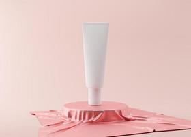 White and blank, unbranded cosmetic cream tube standing on pink silk podium. Skin care product presentation on pink background. Elegant mockup. Skincare, beauty and spa. 3D rendering. photo