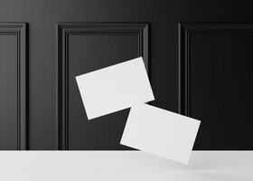 Blank white business cards with classic wall moldings in the background. Mockup for branding identity. Two cards to show both sides. Template for graphic designer. Free space, copy space. 3D rendering photo