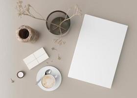 cubierta de libro blanco simulada con taza de café, jarrón y otros accesorios para el hogar en una mesa beige. plantilla en blanco para su diseño. vista superior, primer plano. presentación de portada de libro, catálogo o revista. procesamiento 3d foto