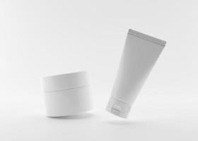 White and blank, unbranded cosmetic cream tube and jar on white background. Skin care products presentation. Minimalist mockup. Free space for your graphic design. Skincare, beauty. 3D rendering. photo