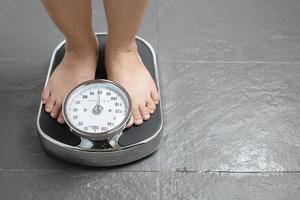 escala de peso para mujeres obesas foto