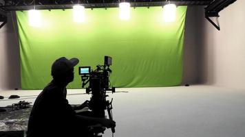 Camera man working in studio. photo