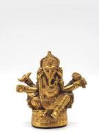 Gold metallic shining ganesha lord of success. photo