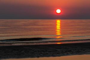 Cloudy Sea Views of the Baltic Sea at Sunset photo