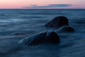 Stones on The Coast of The Baltic Sea at Sunset photo