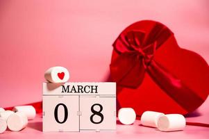Calendar with 8 march date ,sweets and gifts around.Women's day photo