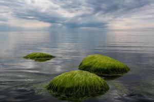 Stones on The Coast of The Baltic Sea at Sunset photo