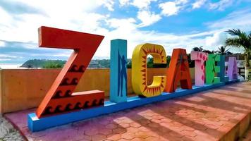 Puerto Escondido Oaxaca Mexico 2022 Colorful Zicatela Puerto Escondido lettering sign symbol on beach Mexico. video