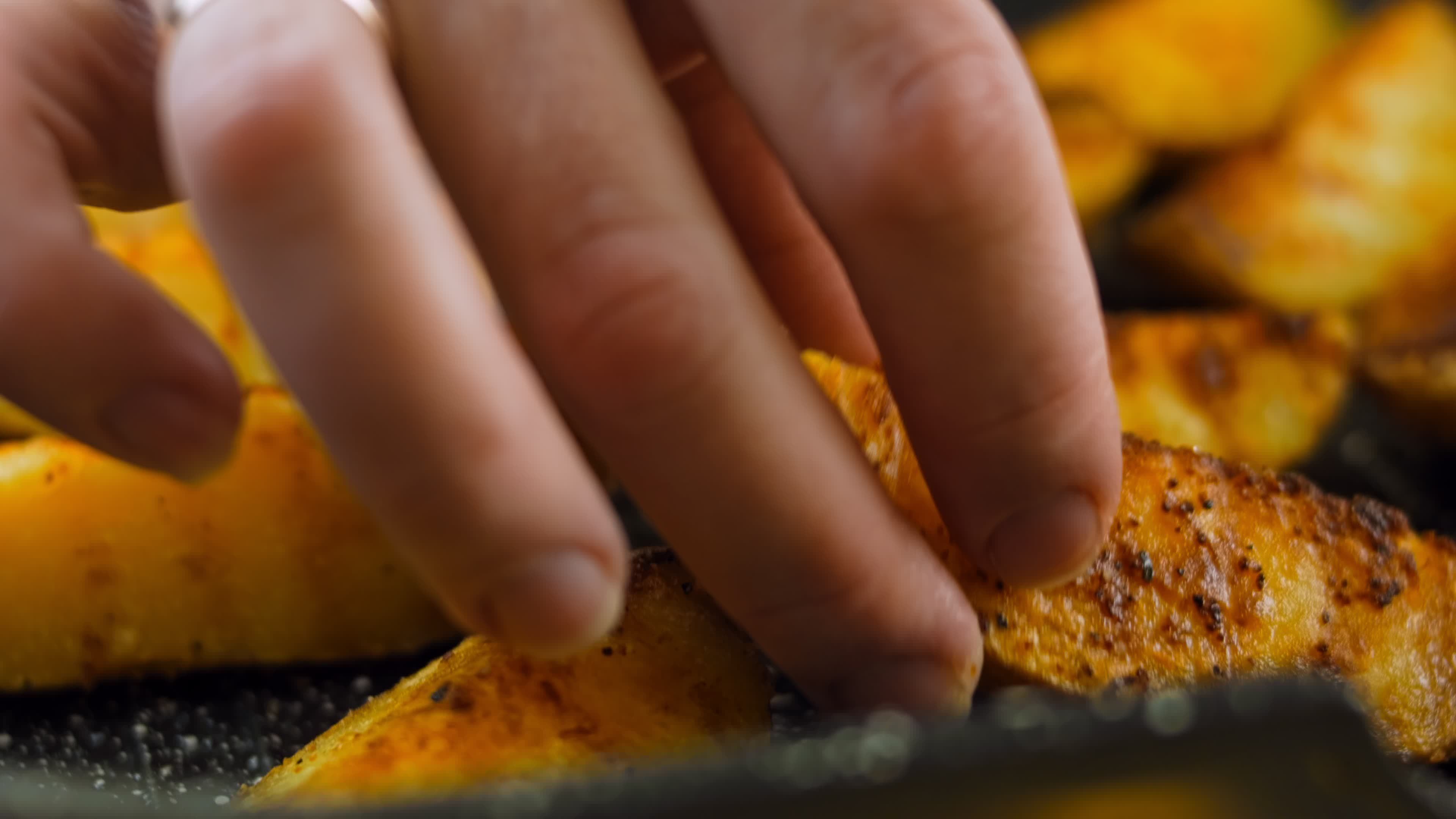 Boil the potatoes in an iron bowl. Macro shooting on intense steam