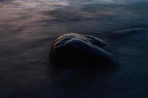 Stones on The Coast of The Baltic Sea at Sunset photo