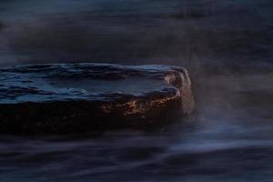 Stones on The Coast of the Baltic Sea at Sunset photo