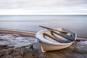 Baltic Sea Coast in Winter With Ice at Sunset photo