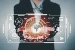 Business woman holding earth access on screen for search engine with cloud computing diagram security. Cloud technology. Data storage. Networking and internet service. Business technology concept. photo