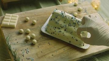 Cake with green dough, sour cherries and sour cream. It also has food ornament and the red star cake video