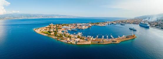 View of the Messina's port with the gold Madonna della Lettera statue photo