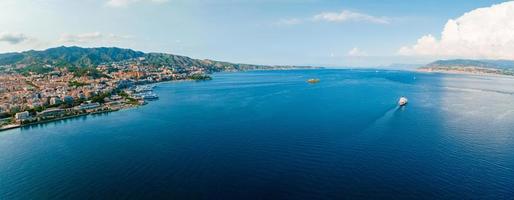 View of the Messina's port with the gold Madonna della Lettera statue photo