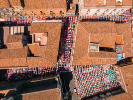 Catania Sicily Italy 2022 Street art decoration using umbrellas at the fish market photo