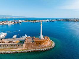 View of the Messina's port with the gold Madonna della Lettera statue photo