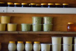 Jars of honey on the counter photo