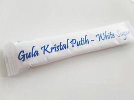 Jakarta, Indonesia in October 2022. This is white crystal sugar stick. photo