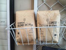 West Java, Indonesia in October 2022. Two local Indonesian coffees with the TUKU brand. photo