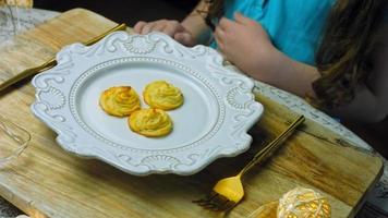 Potato cookies canonic recipe Brie, parmesan and Heavy cream. It is used to decorate retro plate and gold fork